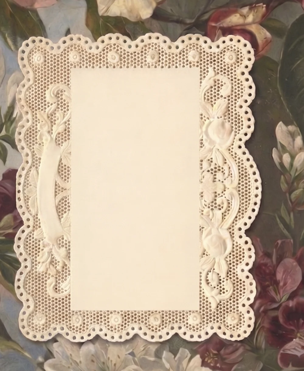 Vintage floral painting framing a blank lace-edged paper card